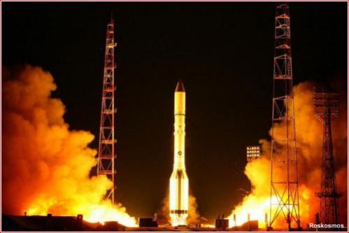 a rocket launching with fire and smoke