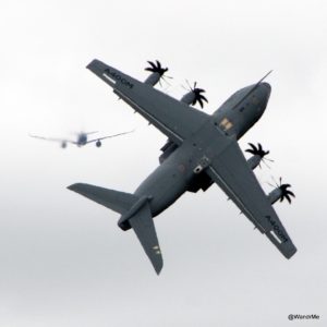 The A400M climbs as the A350 passes into the distance at the Farnborough International Airshow in 2016