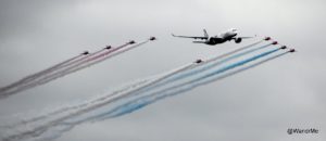 The Red Arrows fly over Farnborough in formation with Airbus' A350