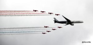 The Red Arrows fly over Farnborough in formation with Airbus' A350