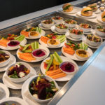 a buffet line of food