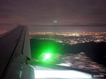This is what a green laser looks like when it hits an airplane at 3000 feet