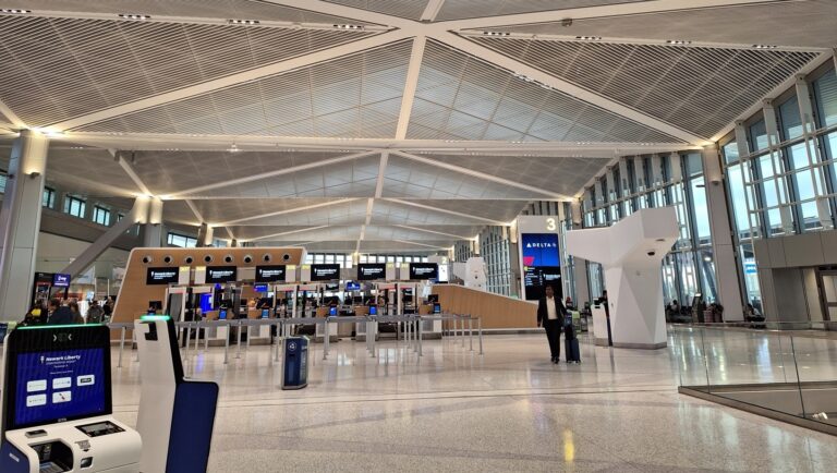 a person walking in a large airport terminal