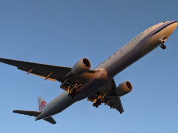 a large airplane flying in the sky