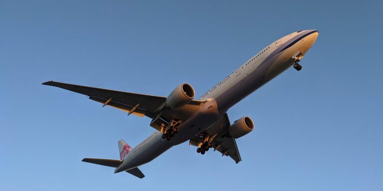 a large airplane flying in the sky